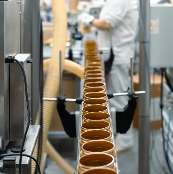 TrustWorks vitamin manufacturing filling line with bottles